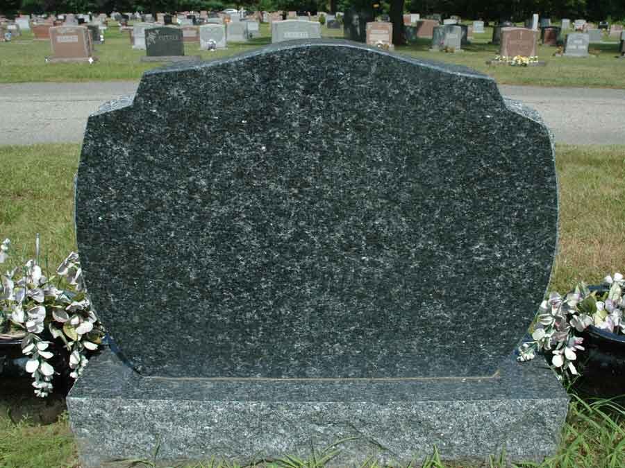 A clean granite headstone in a New England cemetery
